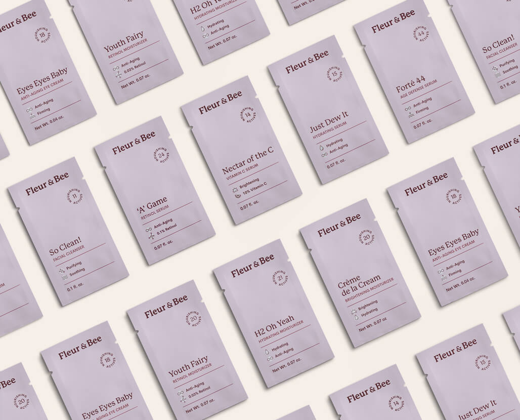 Pattern of Fleur & Bee product packaging on a white background