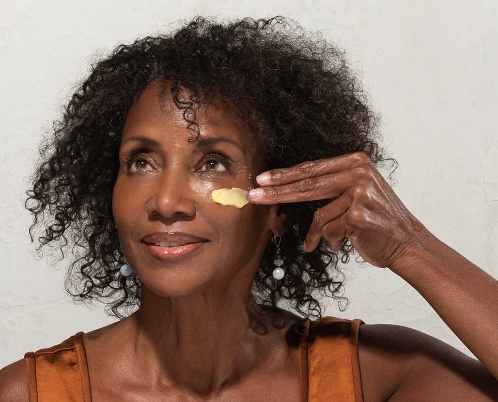 woman applying anti-aging skincare